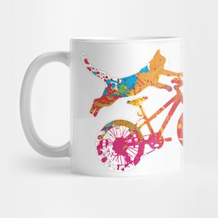 cat on a multicolored bike acrobat Mug